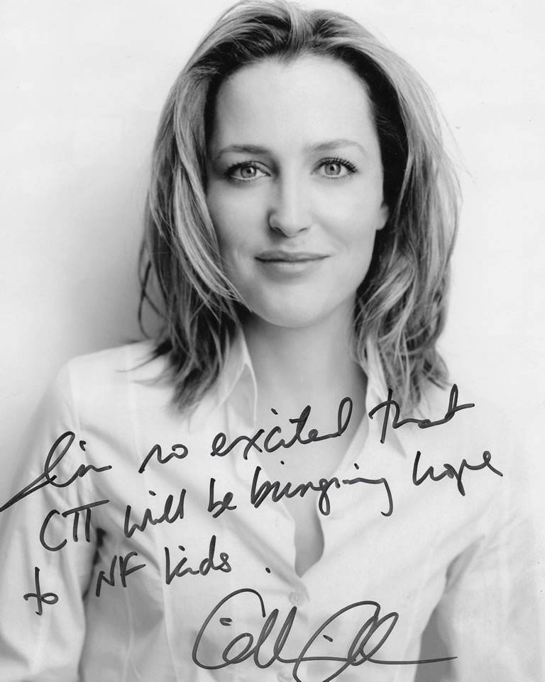 Portrait photo of gillian anderson with her message over the top and signed