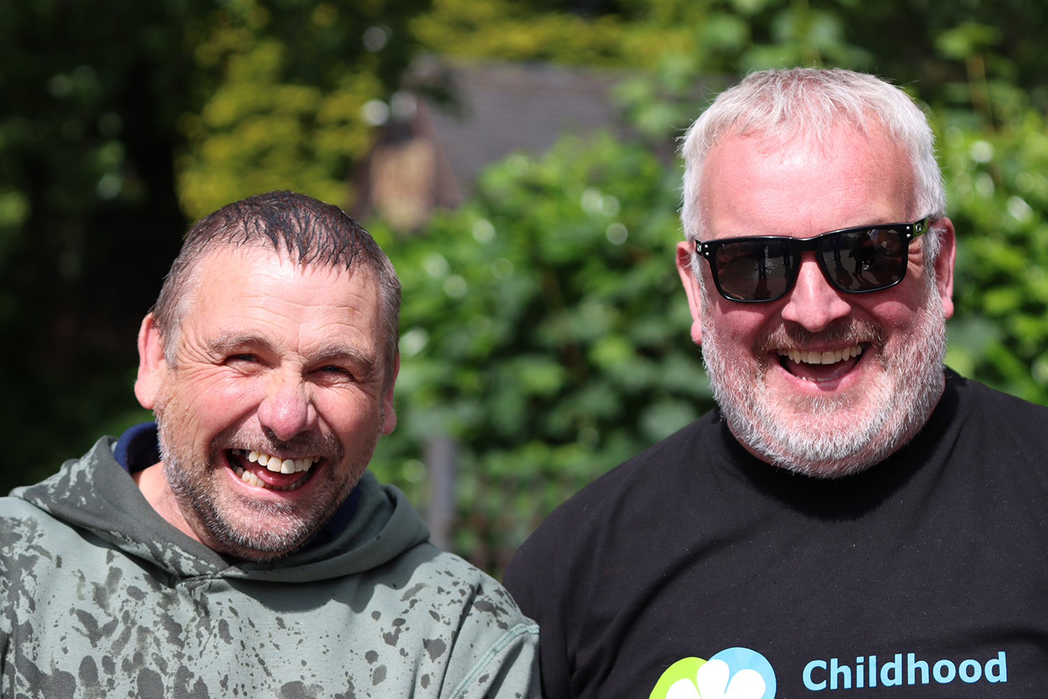 Two men laughing