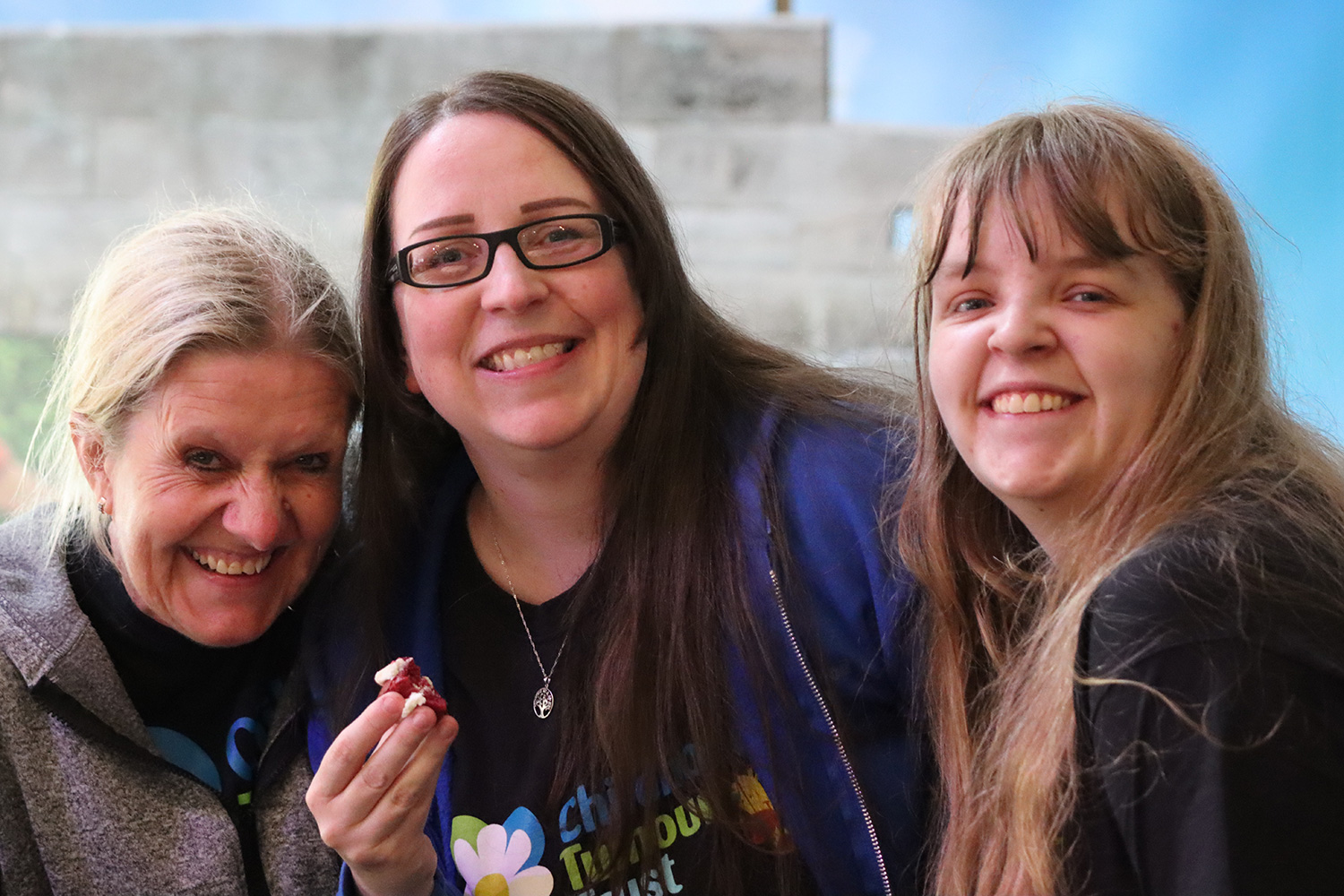 Three ladies smiling