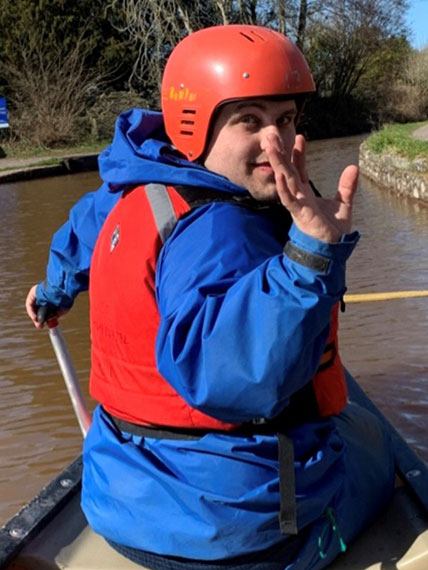 Dan in a boat